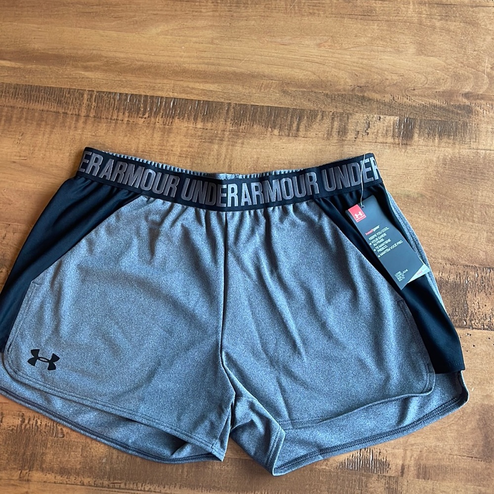 New With Tags  Under Armour Heat Gear shorts. Size Medium